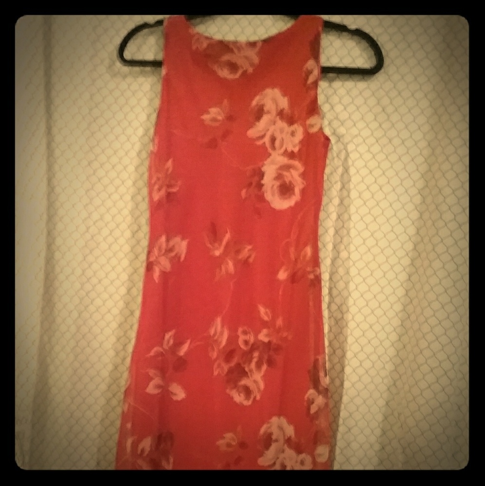 Alyn Paige red open back dress